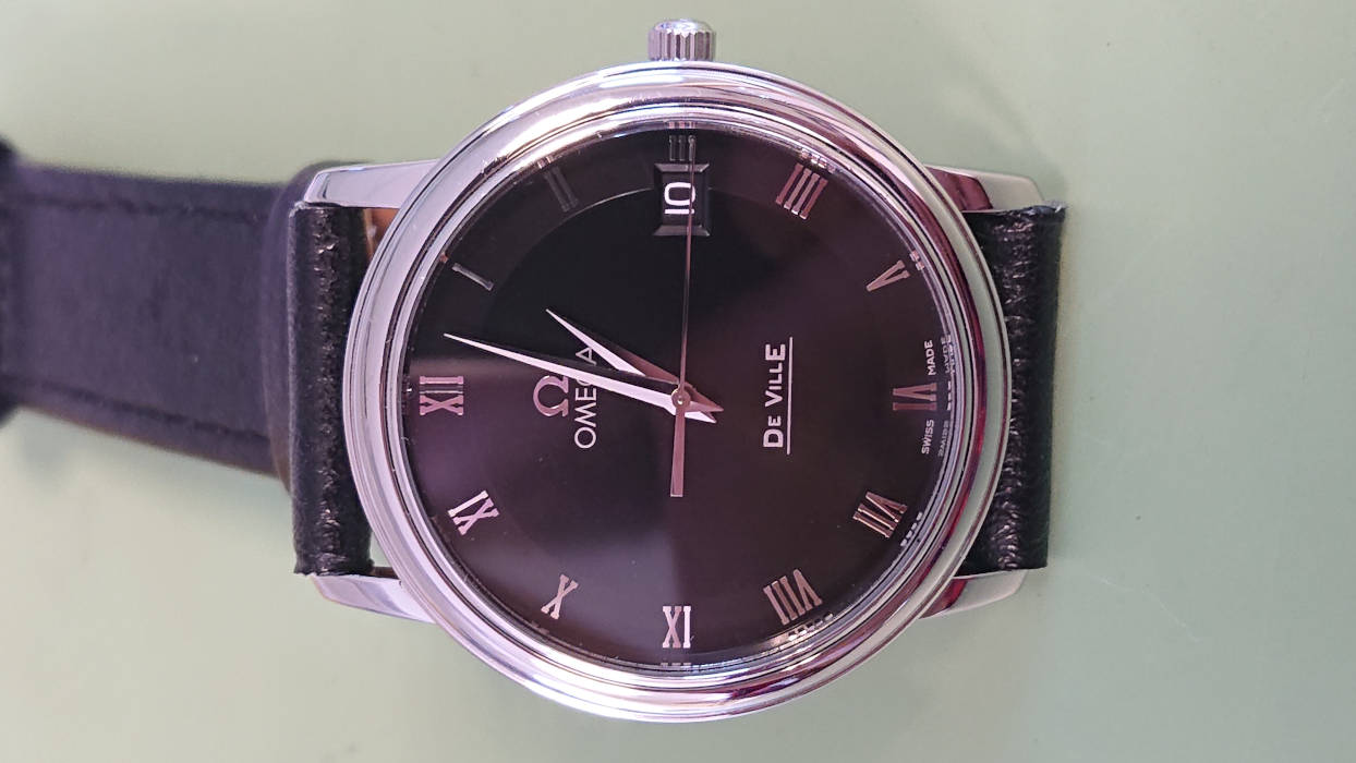 Omega quartz service on sale cost